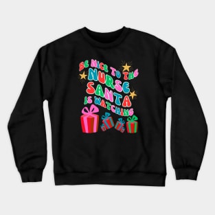 Be nice to the nurse, Santa is watching. Crewneck Sweatshirt